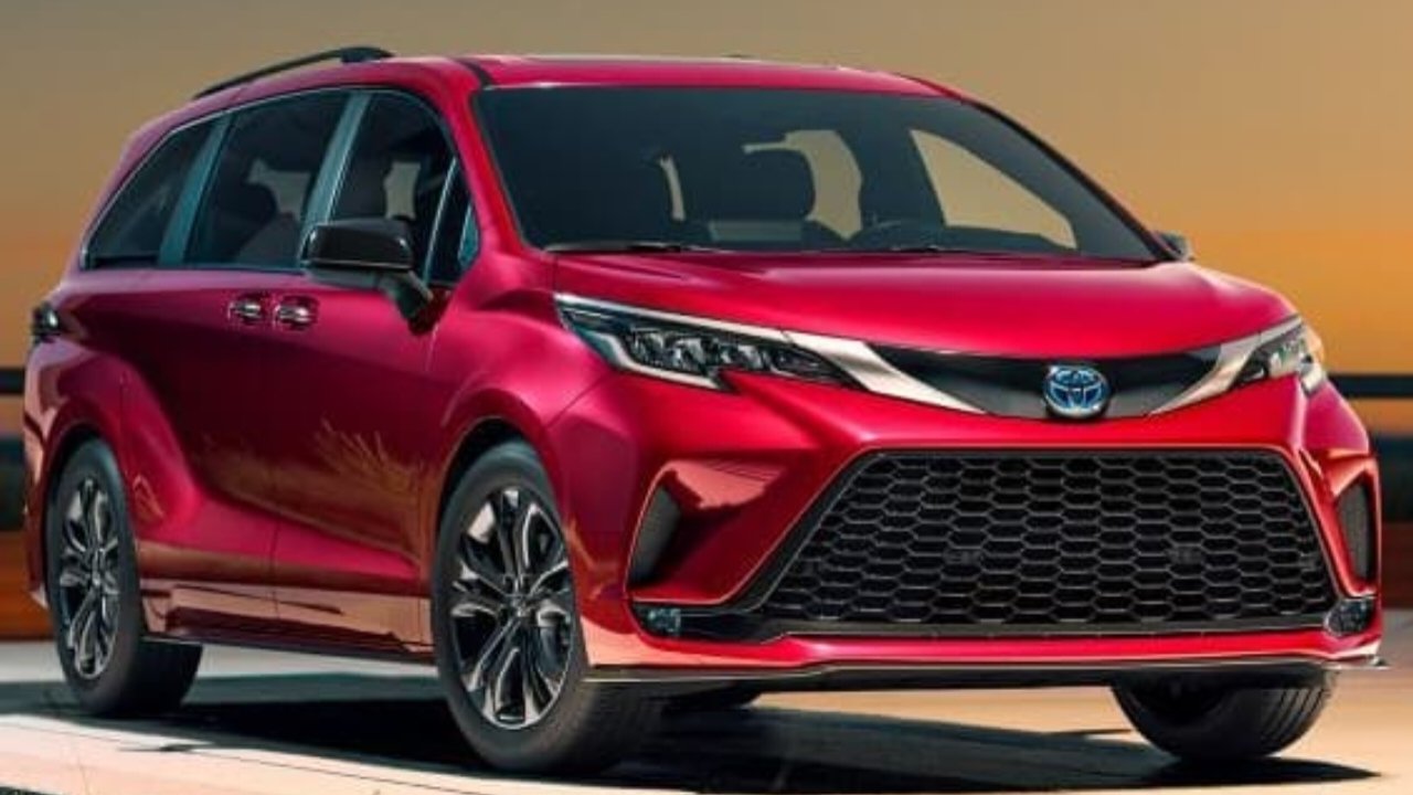 A 2025 Toyota Sienna hybrid minivan in motion, highlighting its efficient and family-friendly design